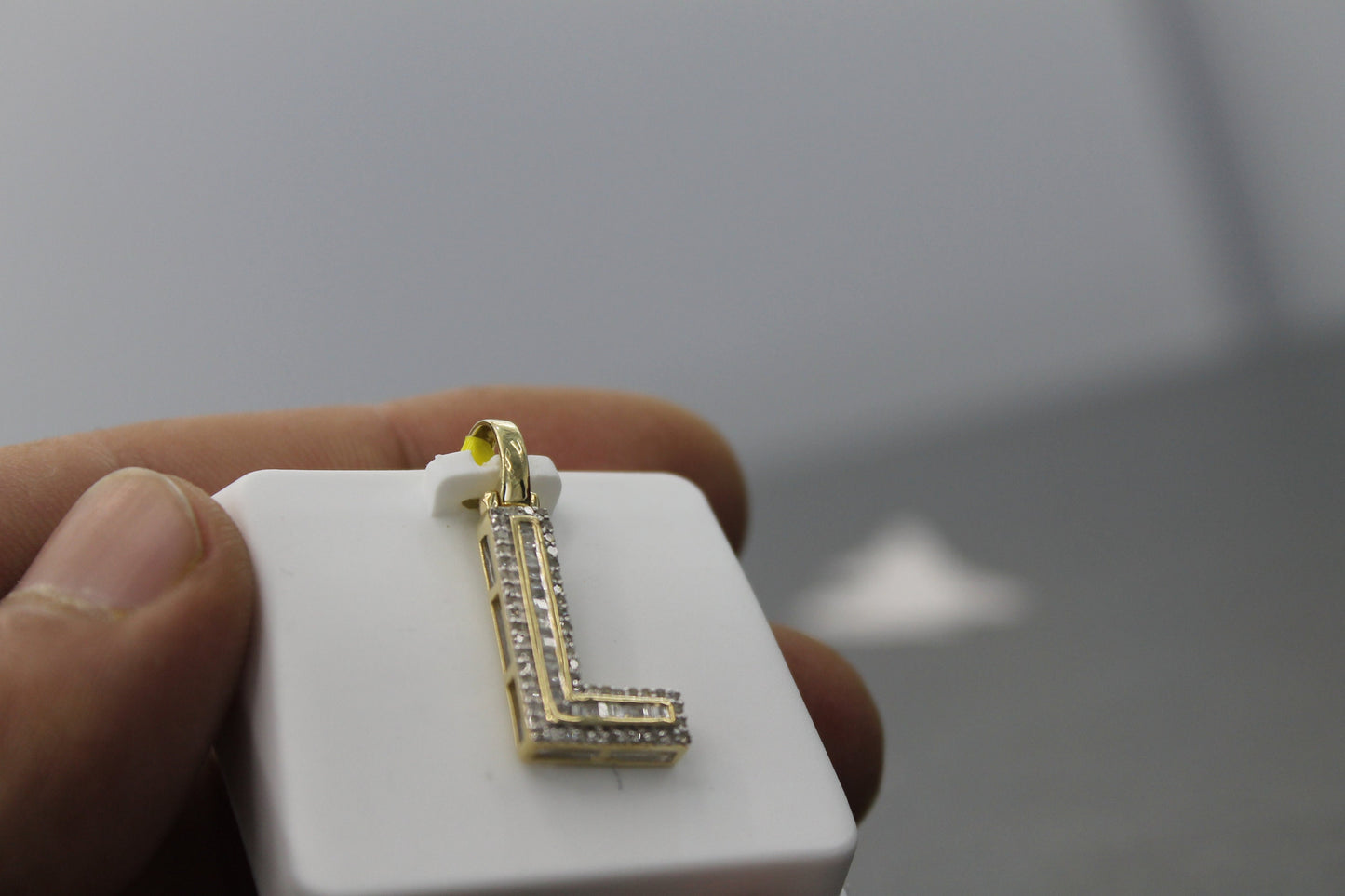 10K Gold with Natural Diamonds Initial L pendant.