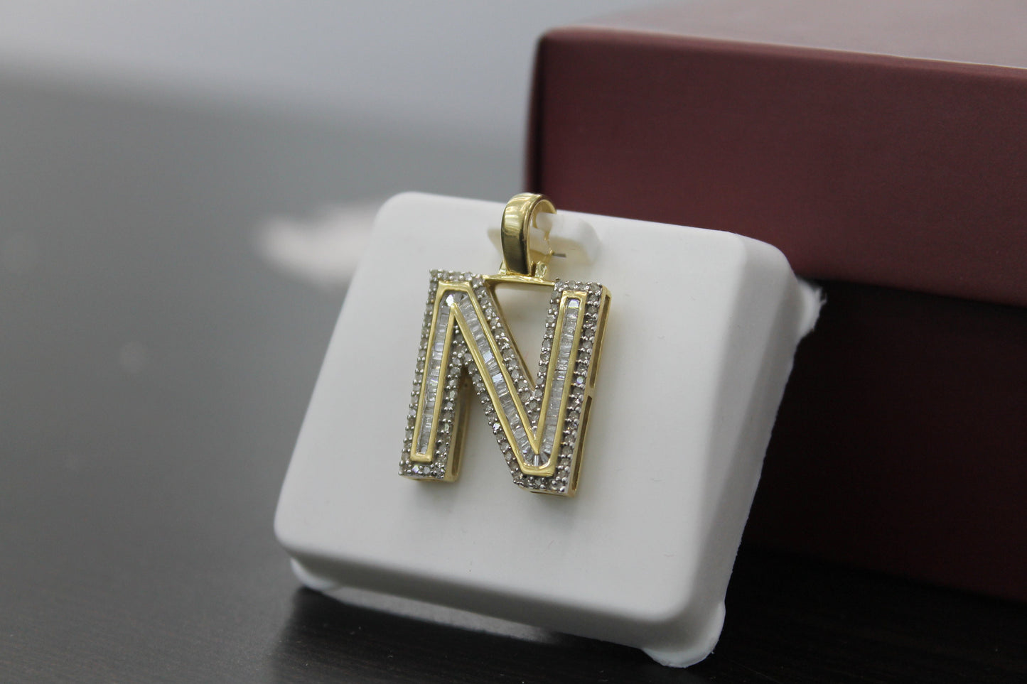 10K Gold with Natural Diamonds Initial N pendant.