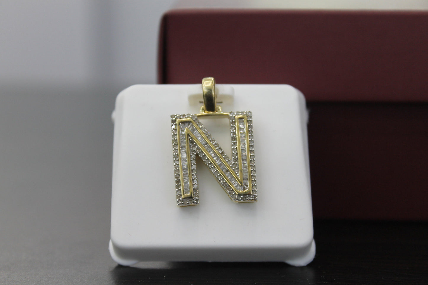 10K Gold with Natural Diamonds Initial N pendant.